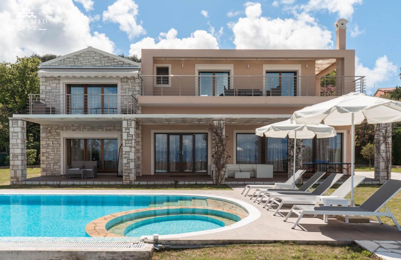 Luxury Villa Hera - Beachfront Roda  Exterior photo